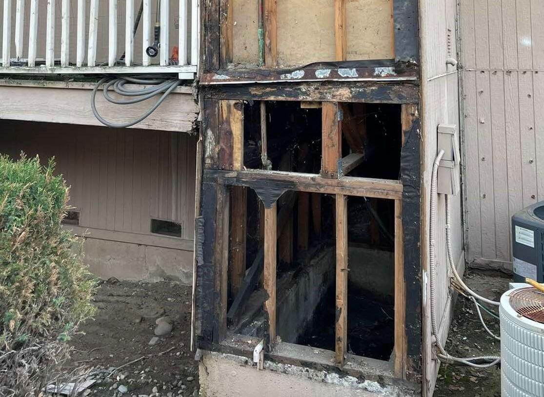 siding and frame damaged by dry rot