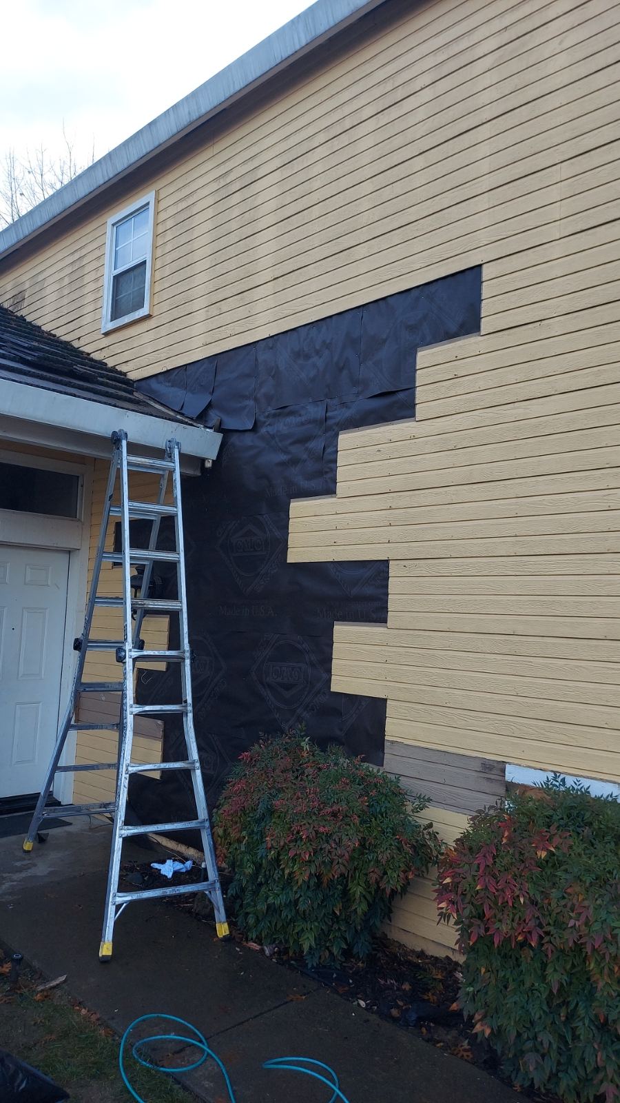 New waterproof paper installed pre siding installation Photo