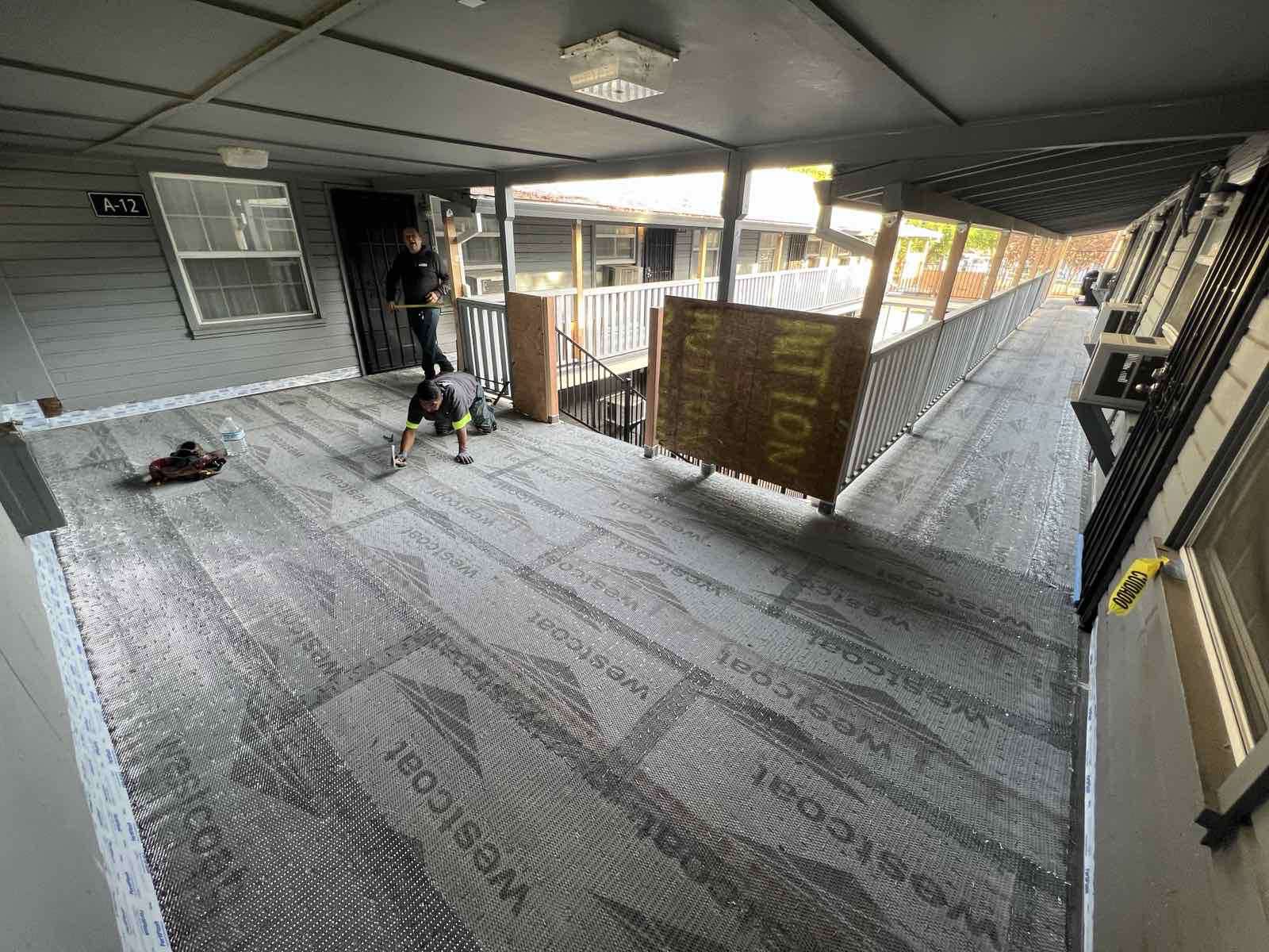 Base Layer of Westcoat Waterproofing system on Apartment Landing Photo