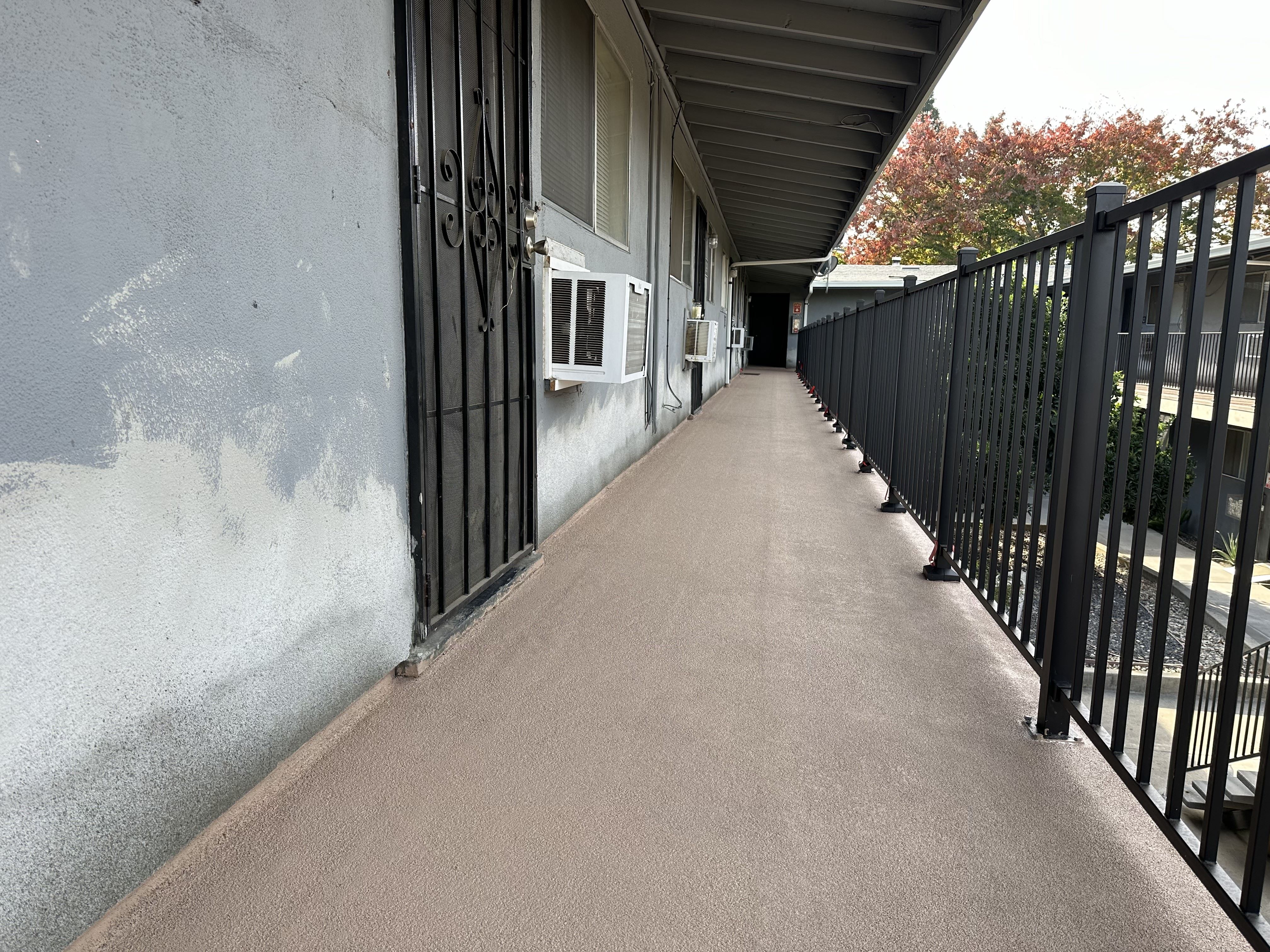 Completed Stucco repair and Waterproof Decking System Photo