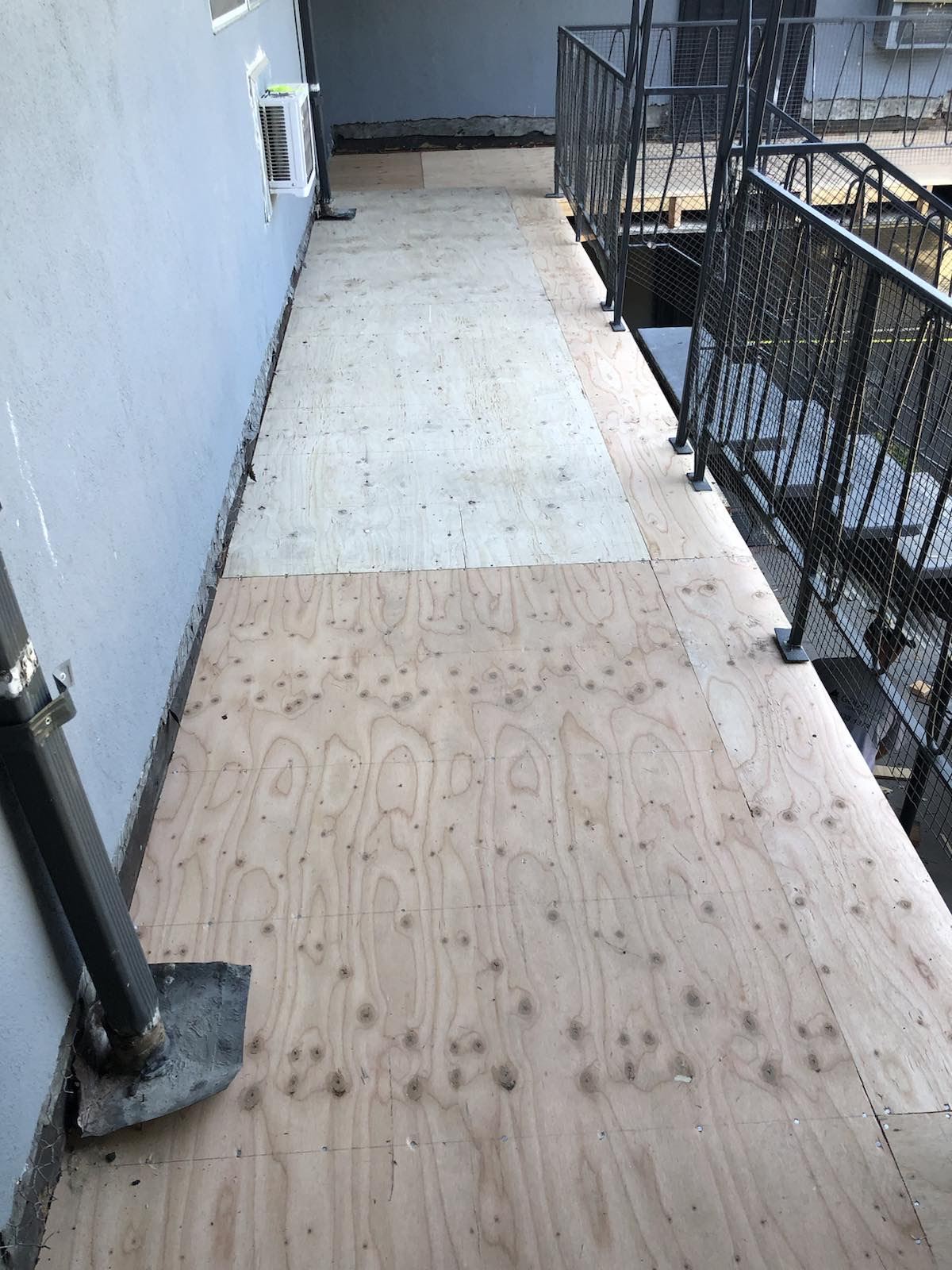 Plywood Sheeting Prepping for Westcoat Waterproof System Photo