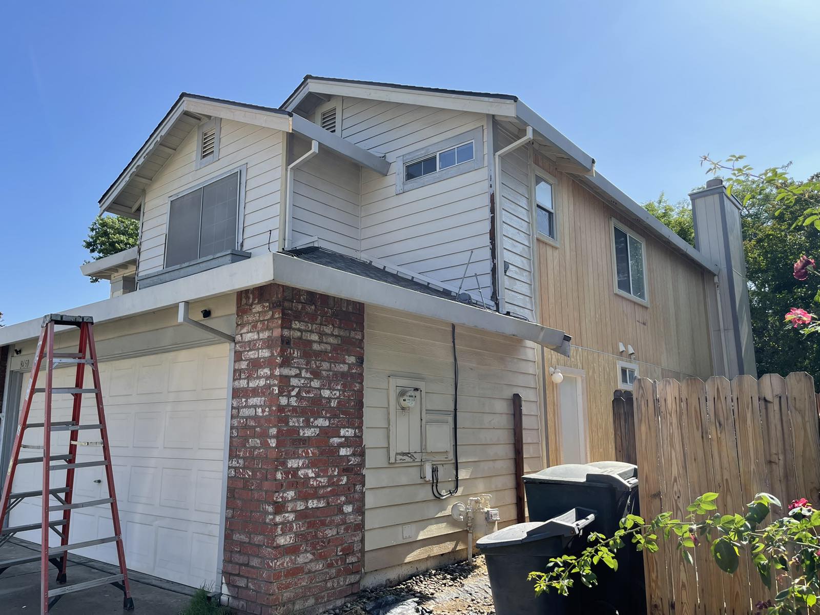 Evidence of damage on old siding, and new T1-11 siding installed on back side Photo