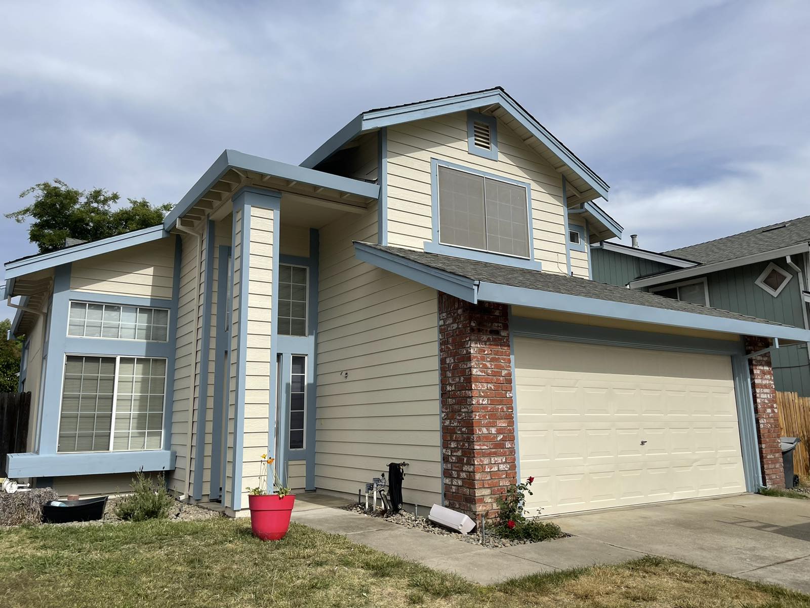 New Look, after repairs performed to siding and exterior paint Photo