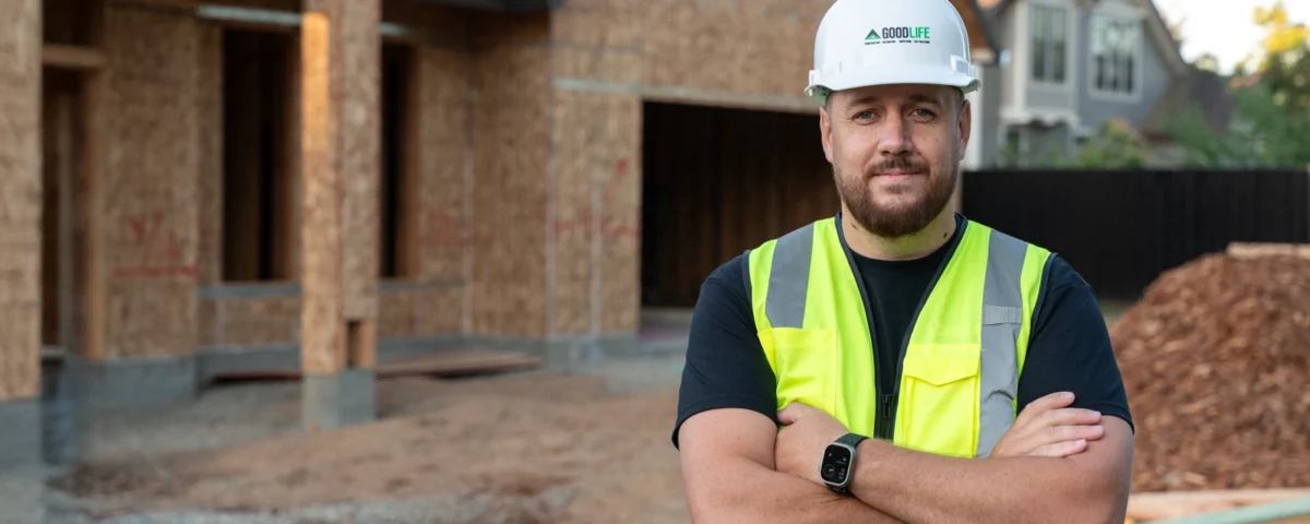 Contractor on a job site preparing to meet California licensing standards.