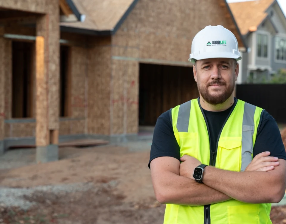Contractor on a job site preparing to meet California licensing standards.