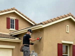 Stucco repair in progress by Good Life Construction