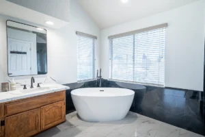 Modern bathroom interior with decorative shelf and clean finishes