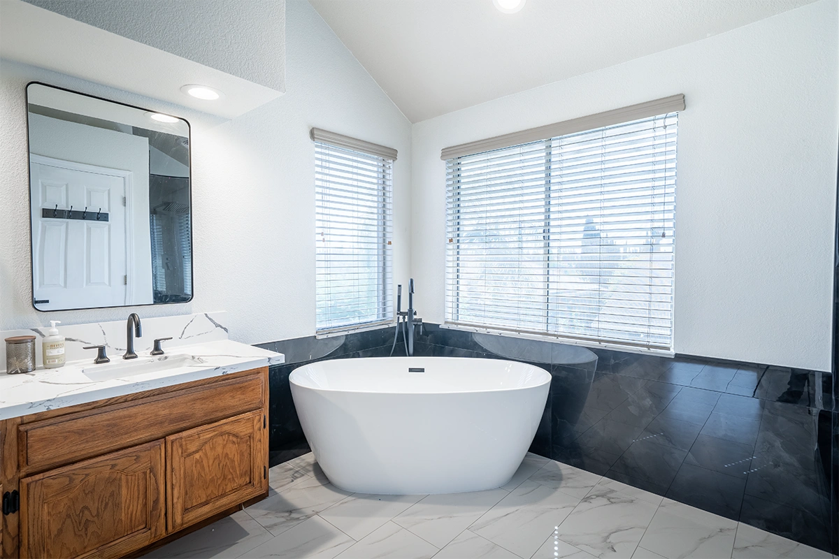 Modern bathroom interior with decorative shelf and clean finishes